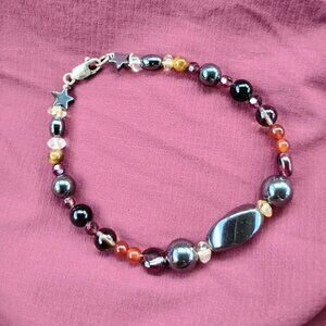 Elegant Multicolor Beaded Bracelet With A Fastener And Hematite Accents